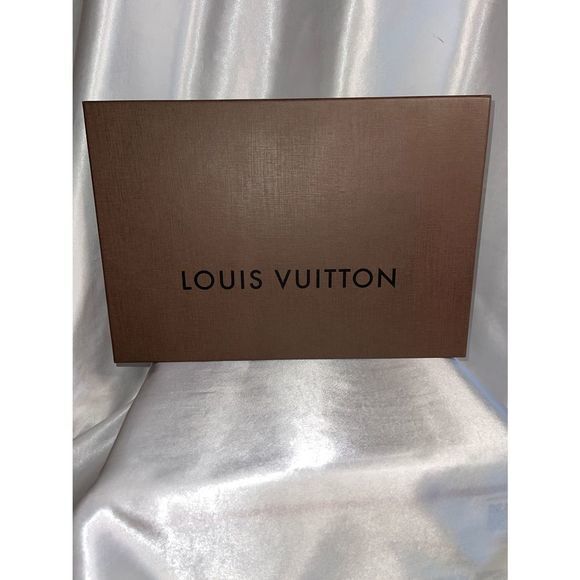 Authentic Louis Vuitton box
14 in. X 10 X 2 in. 

Item 807 - Picture 1 of 3